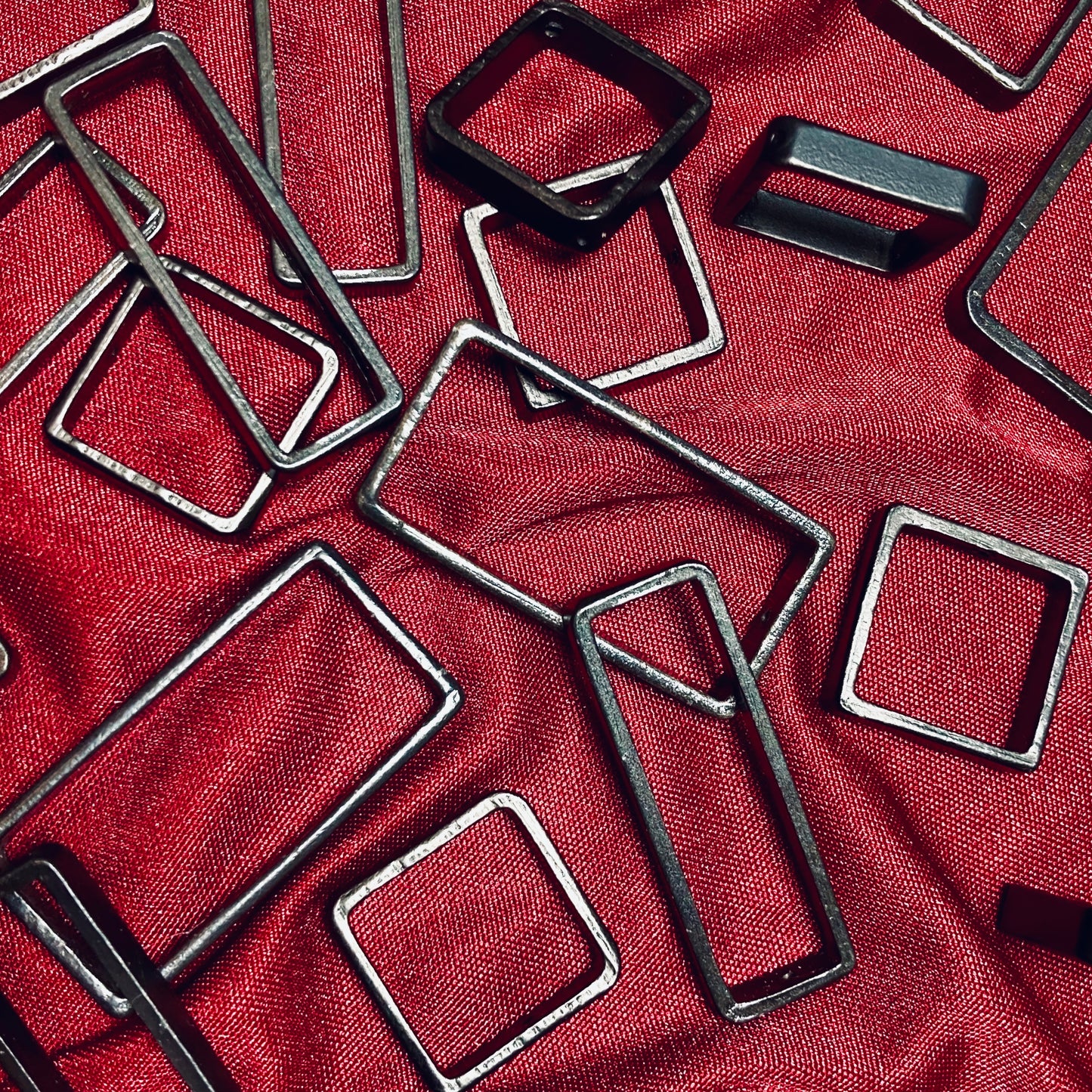 Blackened steel and silver rectangle earring