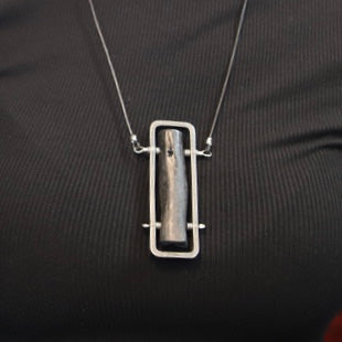 Binchotan steel and silver pendant