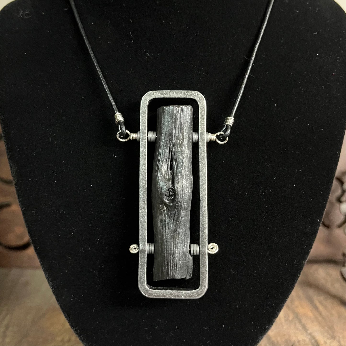 Binchotan steel and silver pendant