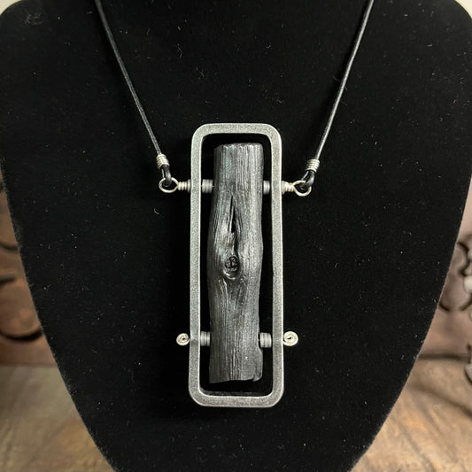 Binchotan steel and silver pendant