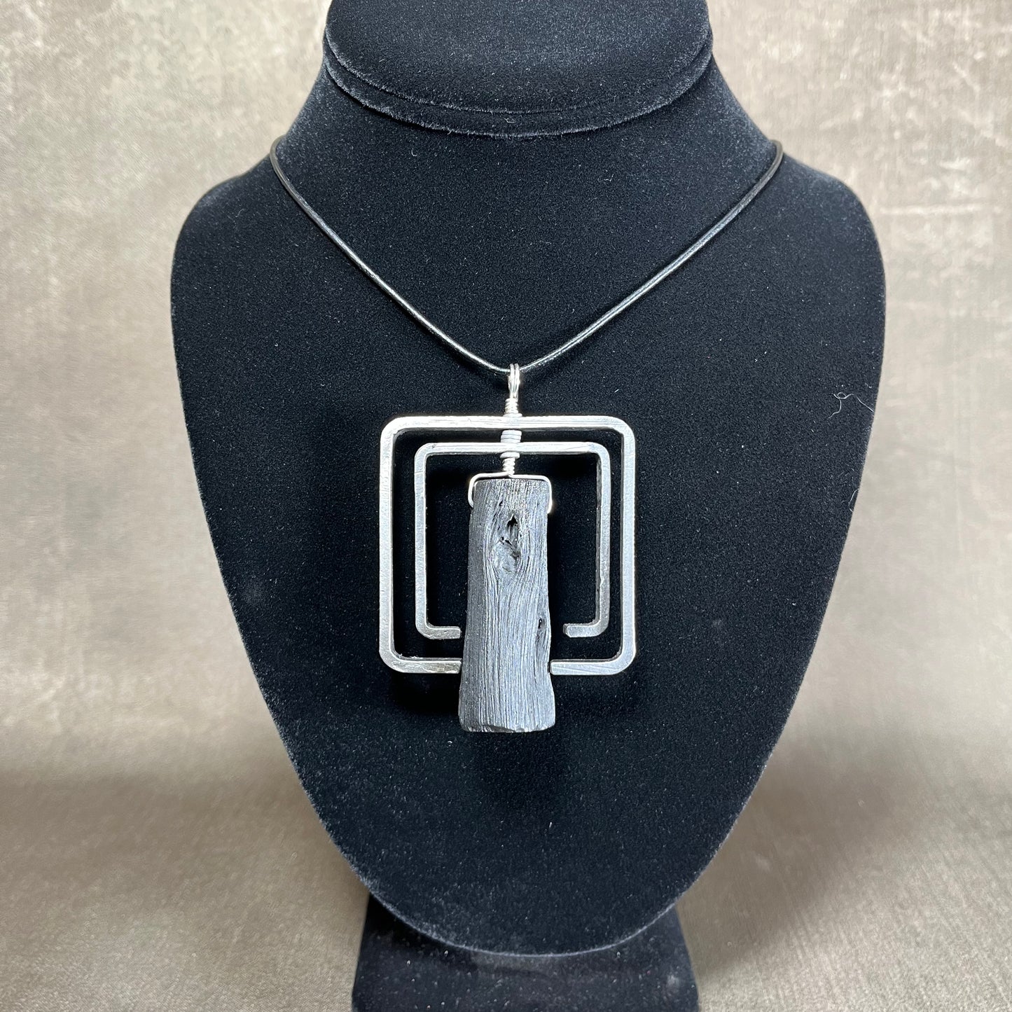 Binchotan and steel pendant