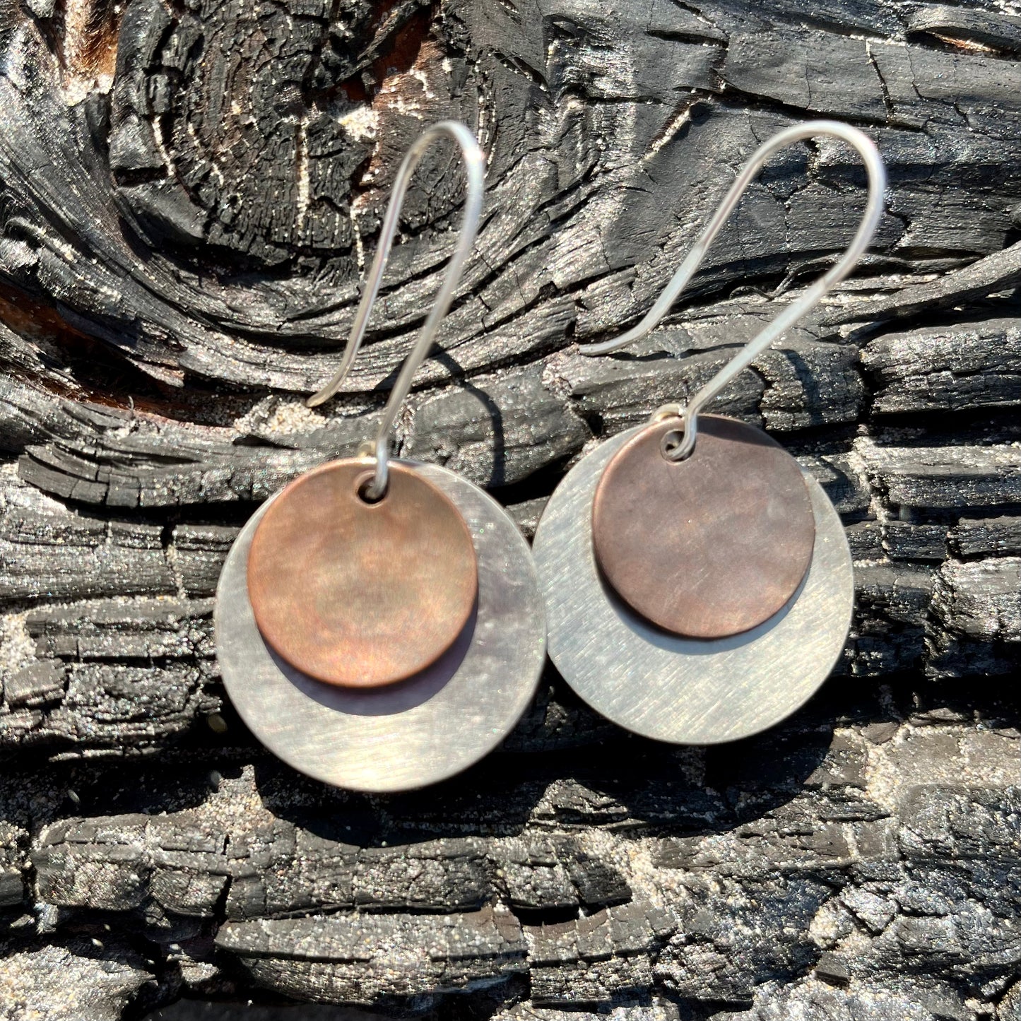 Silver and darkened bronze dangle earrings