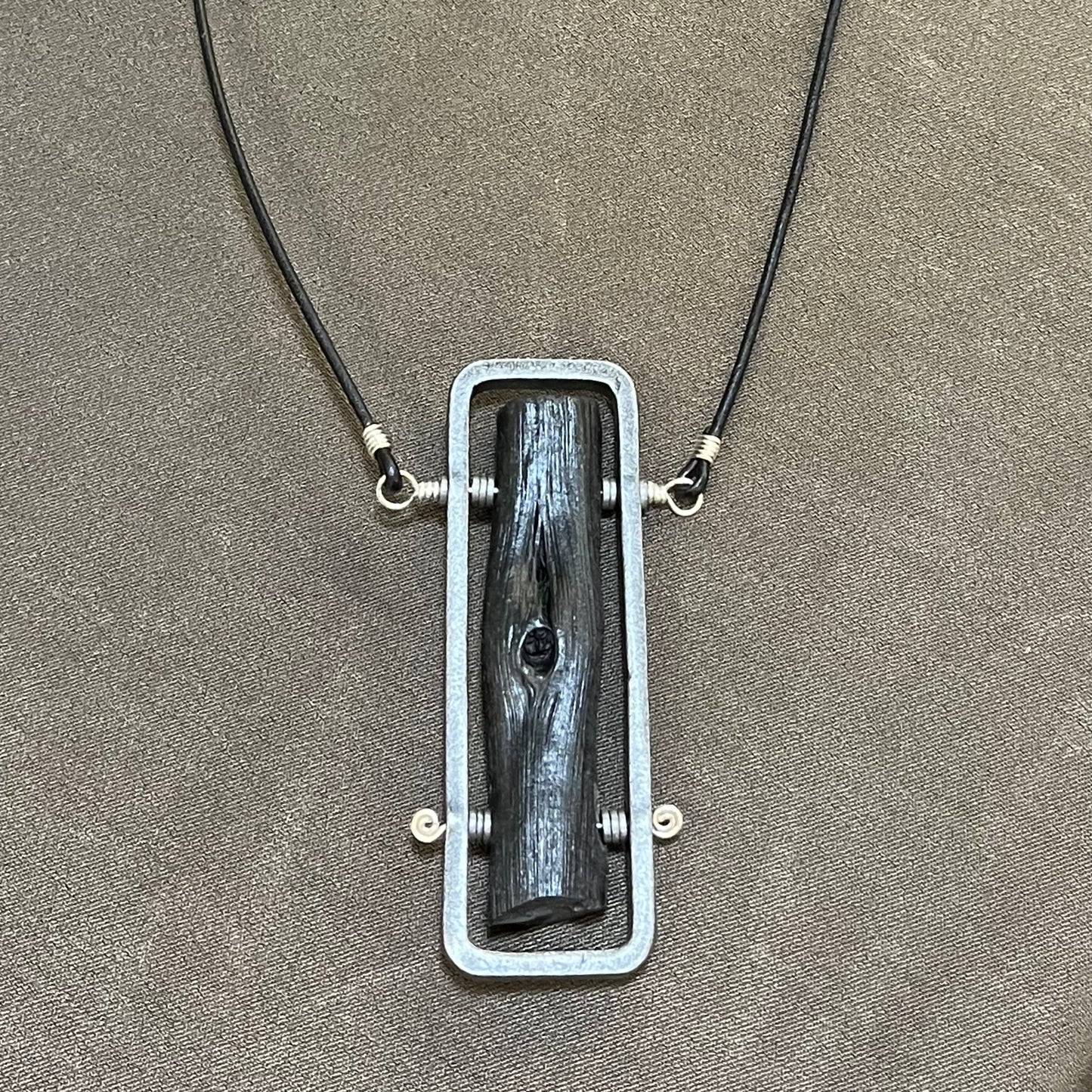 Binchotan steel and silver pendant