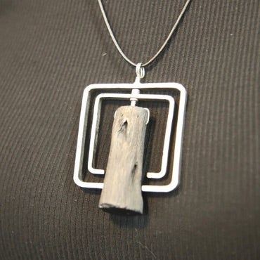 Binchotan and steel pendant