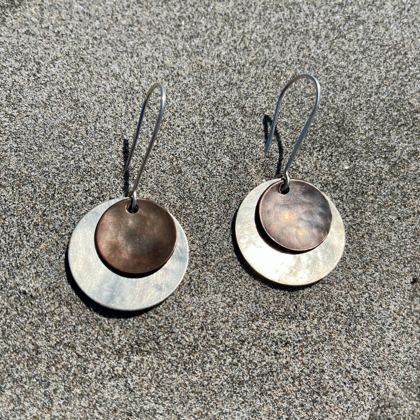 Silver and darkened bronze dangle earrings