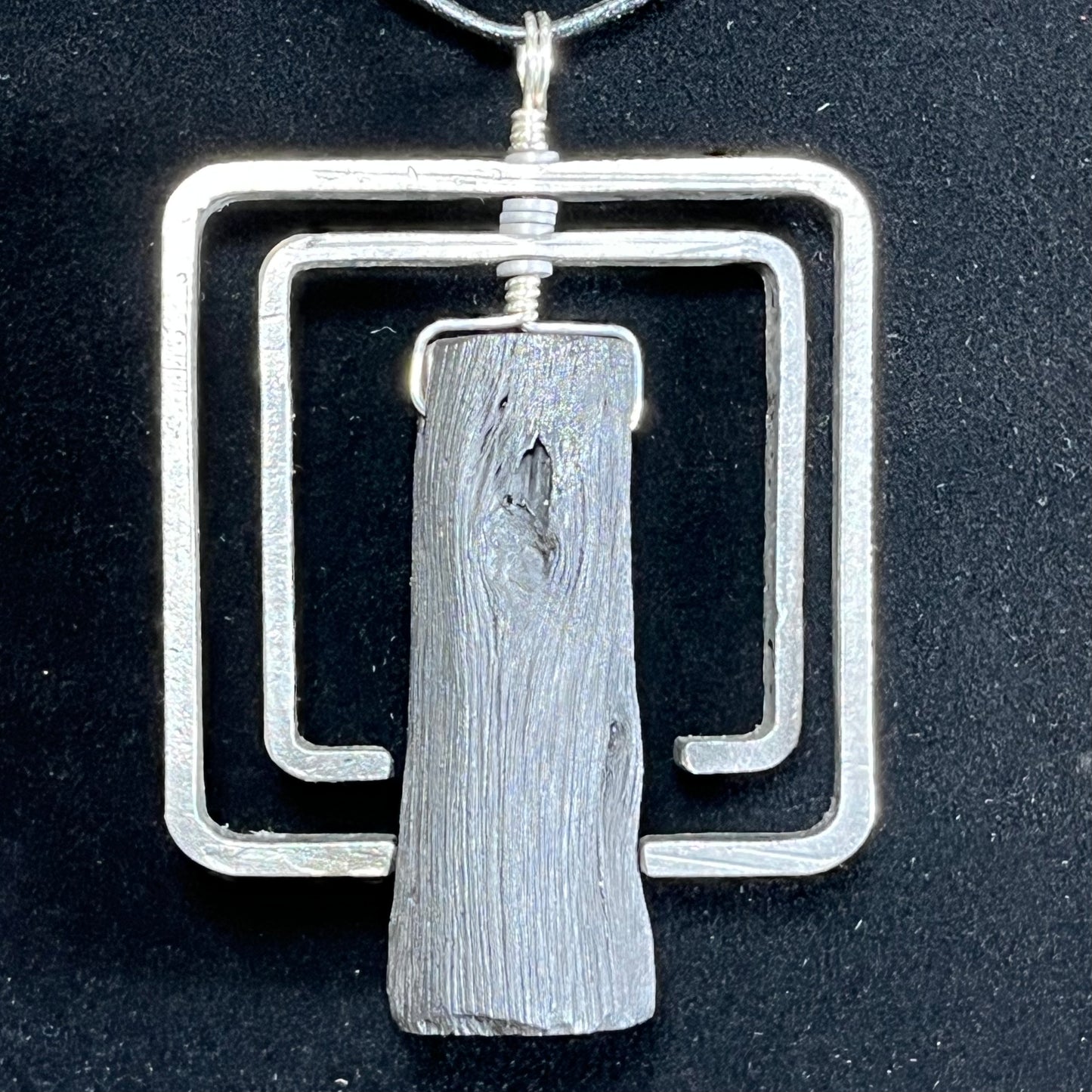 Binchotan and steel pendant