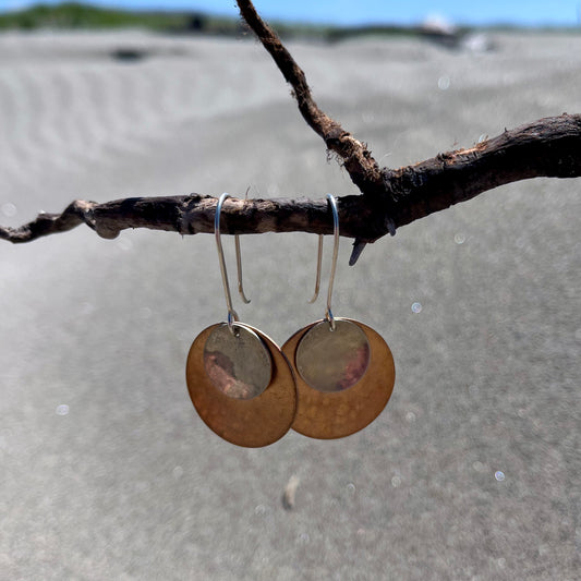 Hand hammered bronze and silver dangle earrings