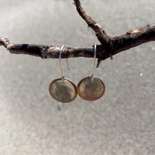 Hand hammered bronze and silver dangle earrings