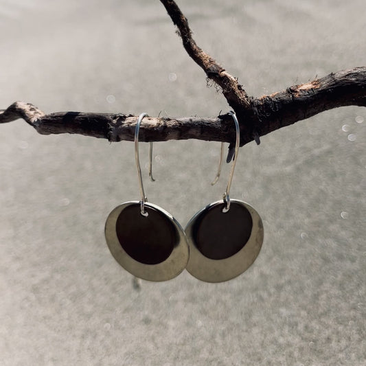 Silver and darkened bronze dangle earrings