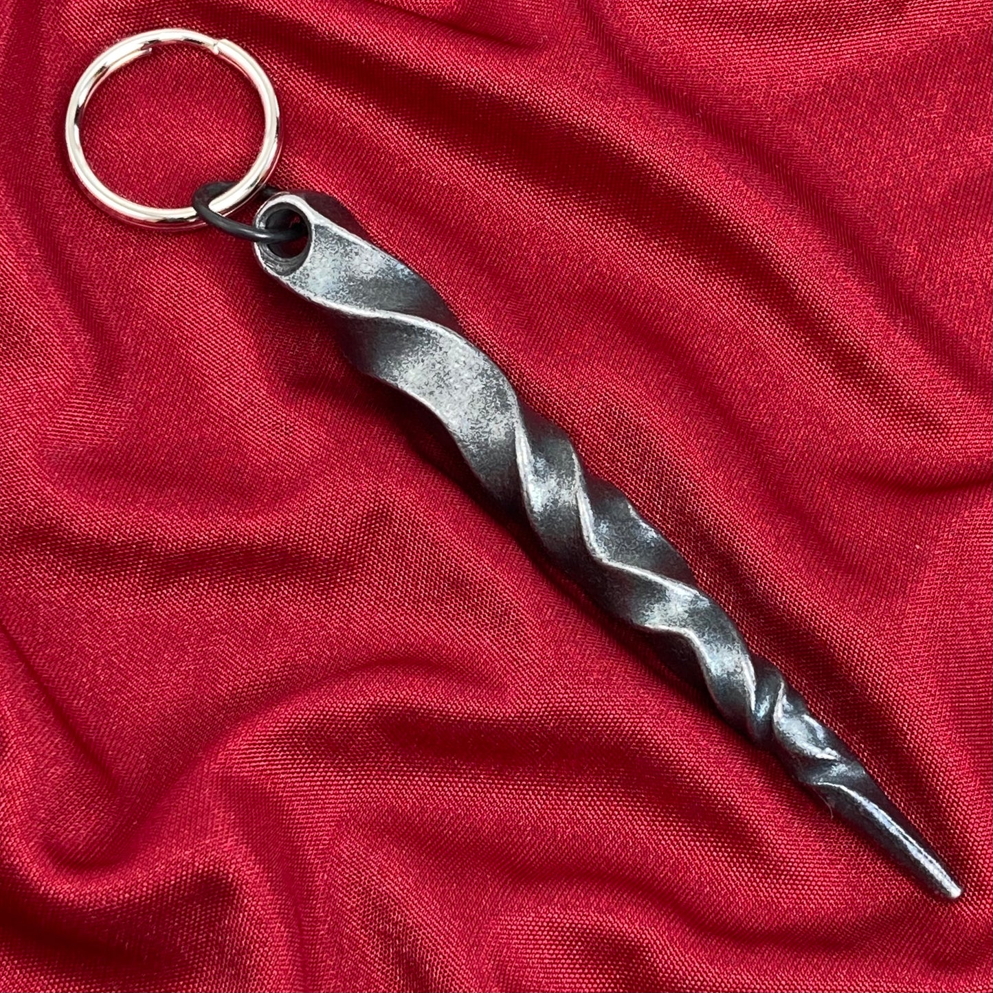 Twisted metal spike key ring fob