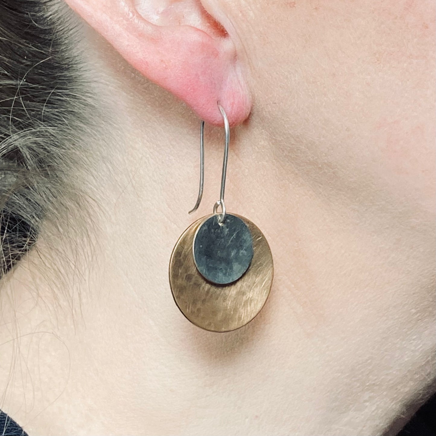 Hand hammered bronze and silver dangle earrings