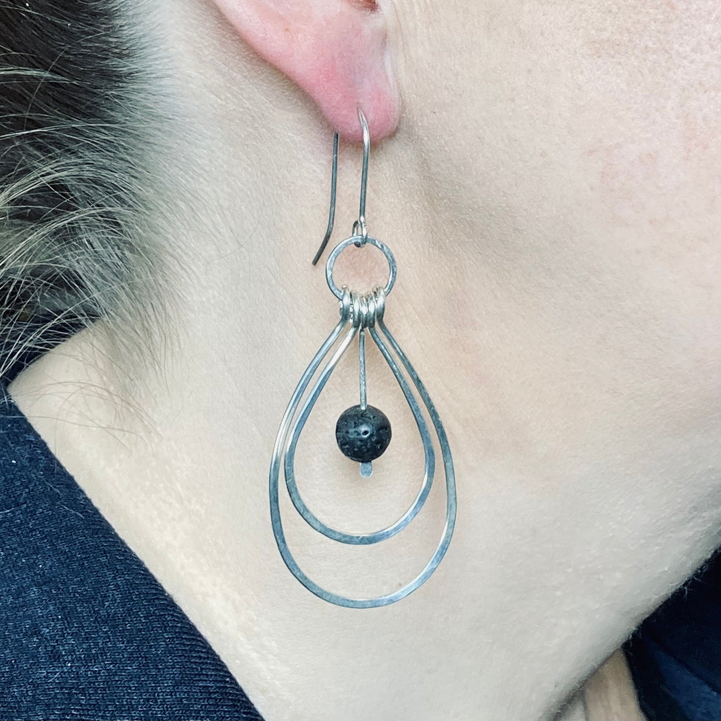 Hand formed Sterling silver and lava loop earrings