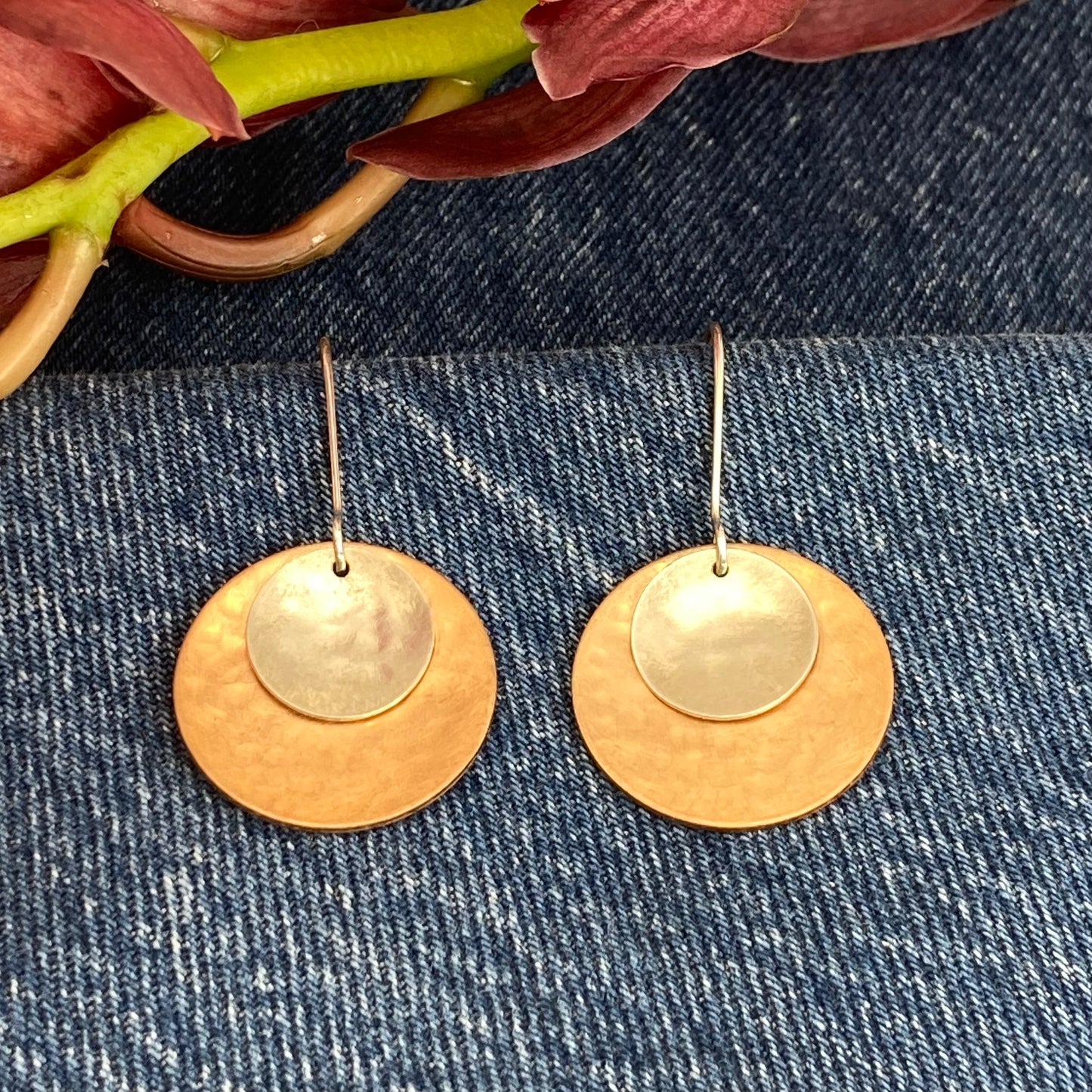 Hand hammered bronze and silver dangle earrings