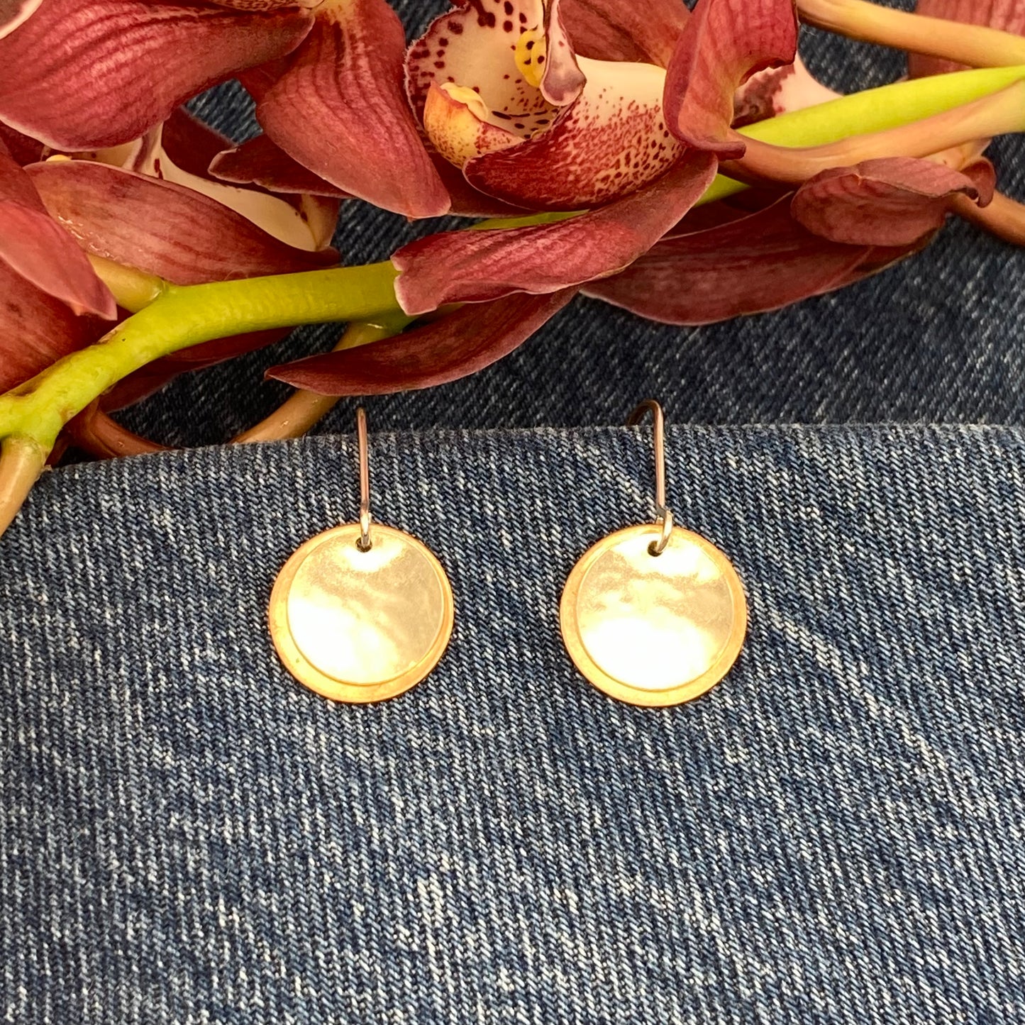 Hand hammered bronze and silver dangle earrings