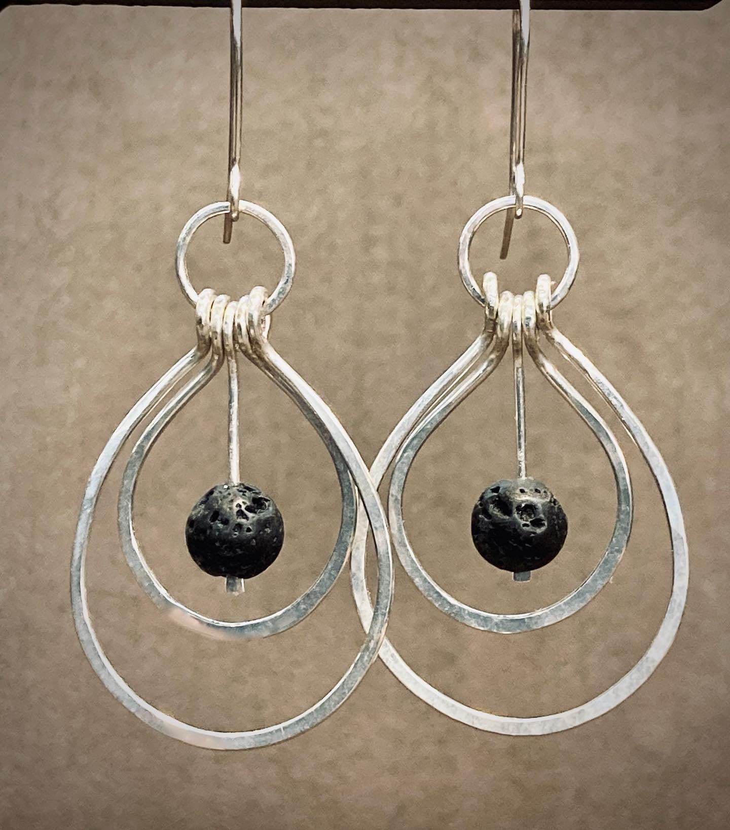 Hand formed Sterling silver and lava loop earrings