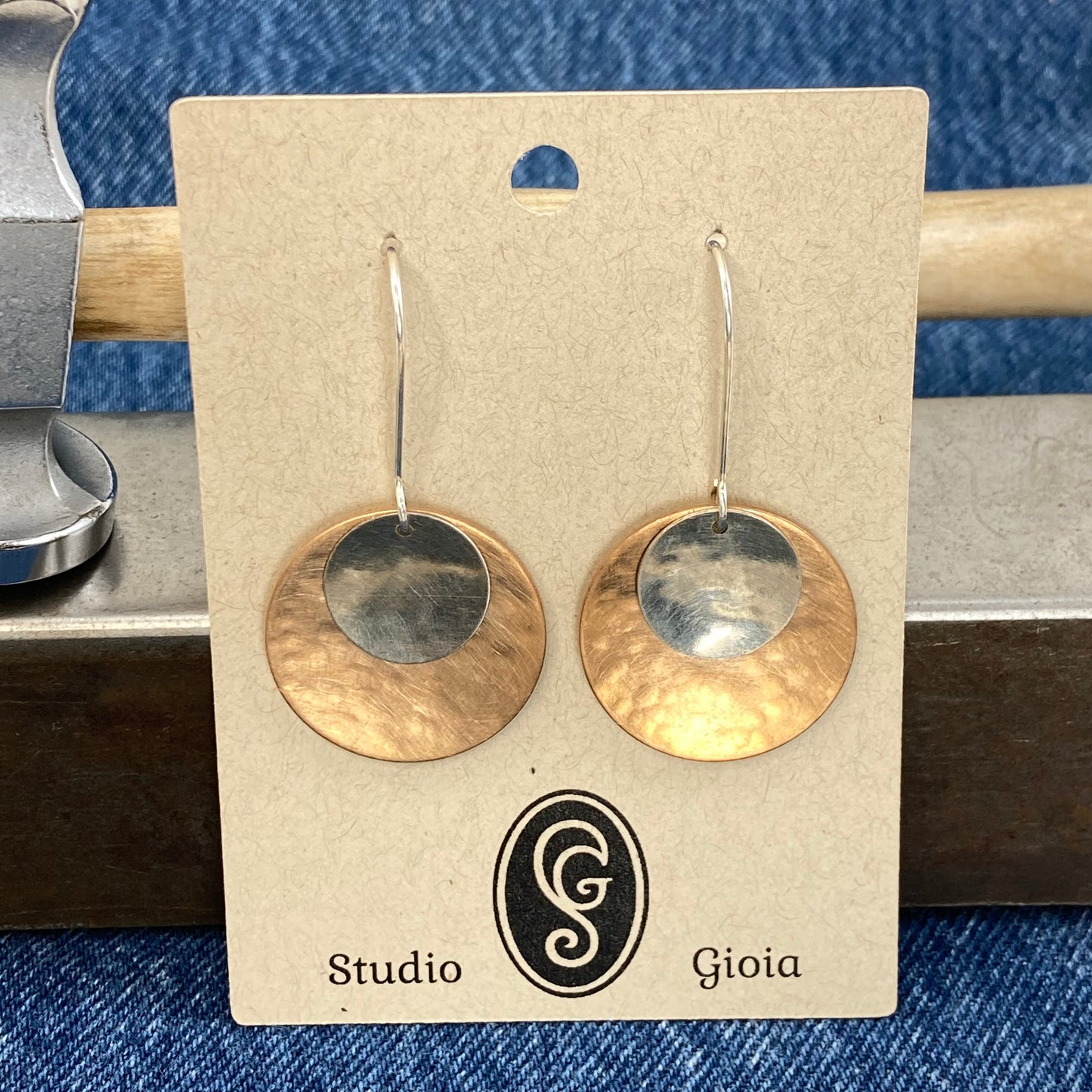 Hand hammered bronze and silver dangle earrings