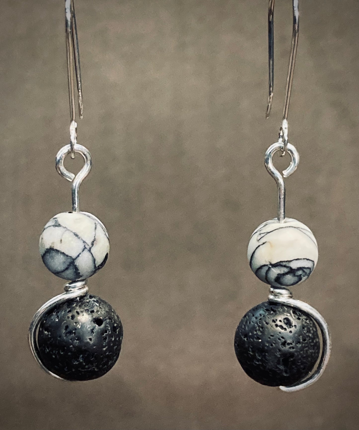 Black lava and white howlite, silver wrapped drop earrings