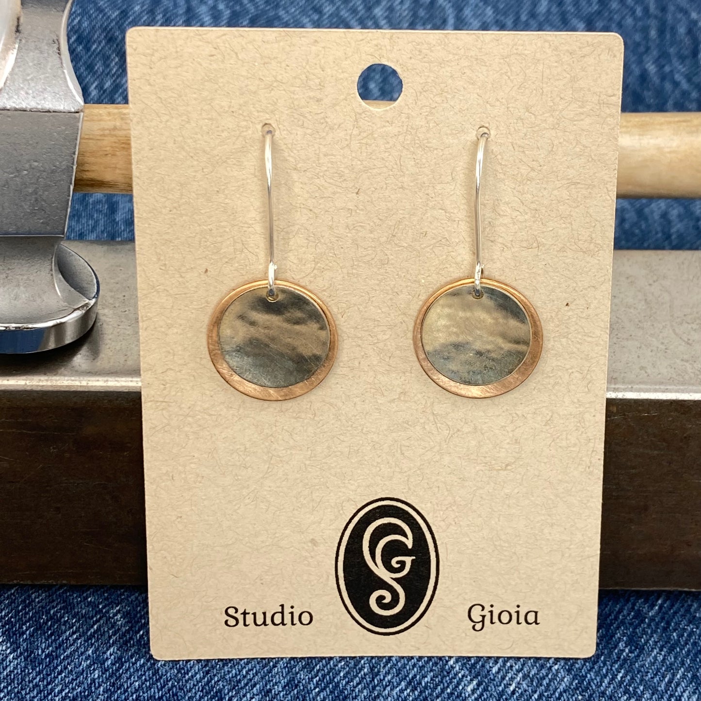 Hand hammered bronze and silver dangle earrings