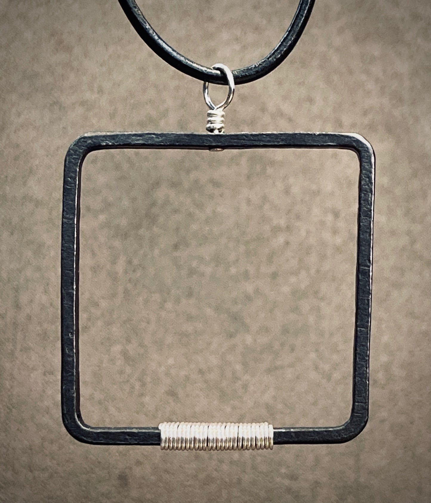 Blackened steel square pendant, silver wrapped