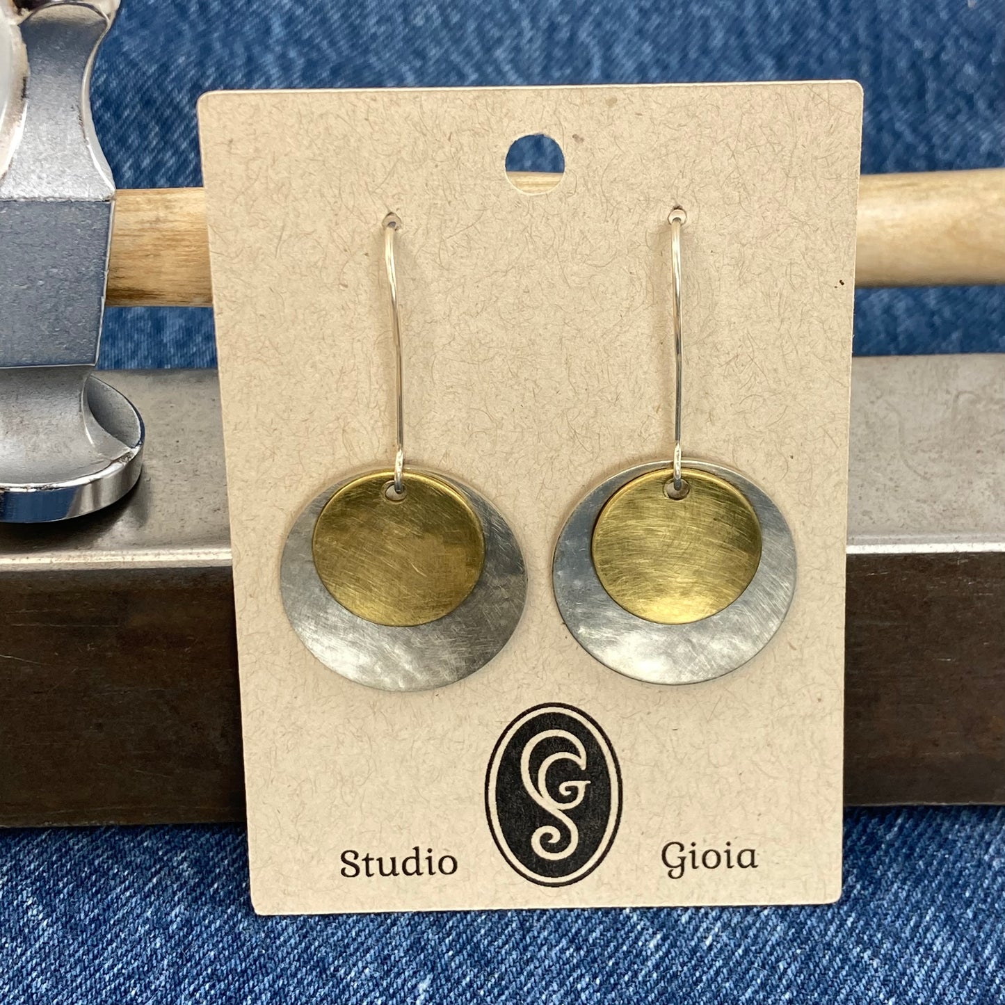 Hand hammered silver and brass dangle earrings