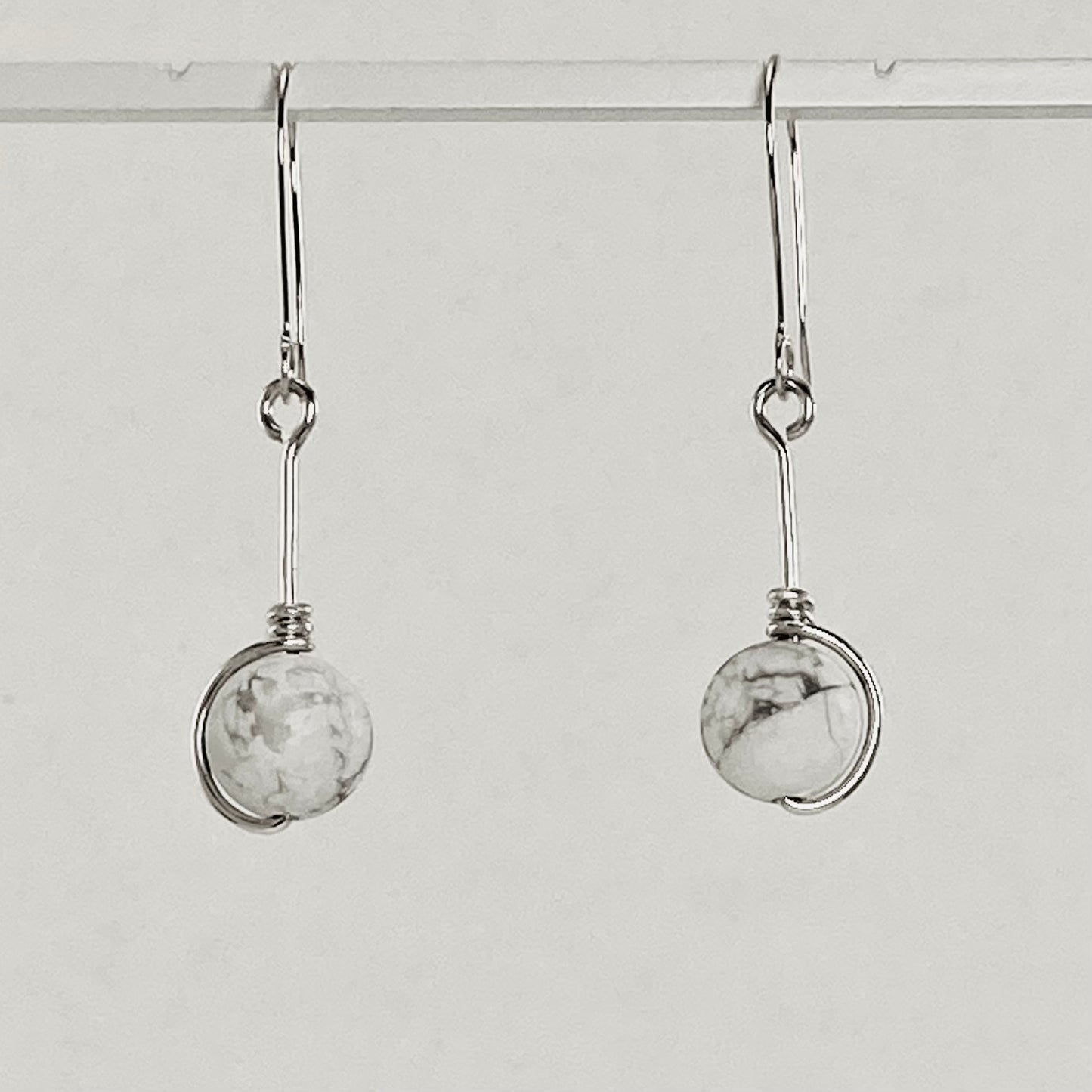 Silver wrapped howlite drop earrings