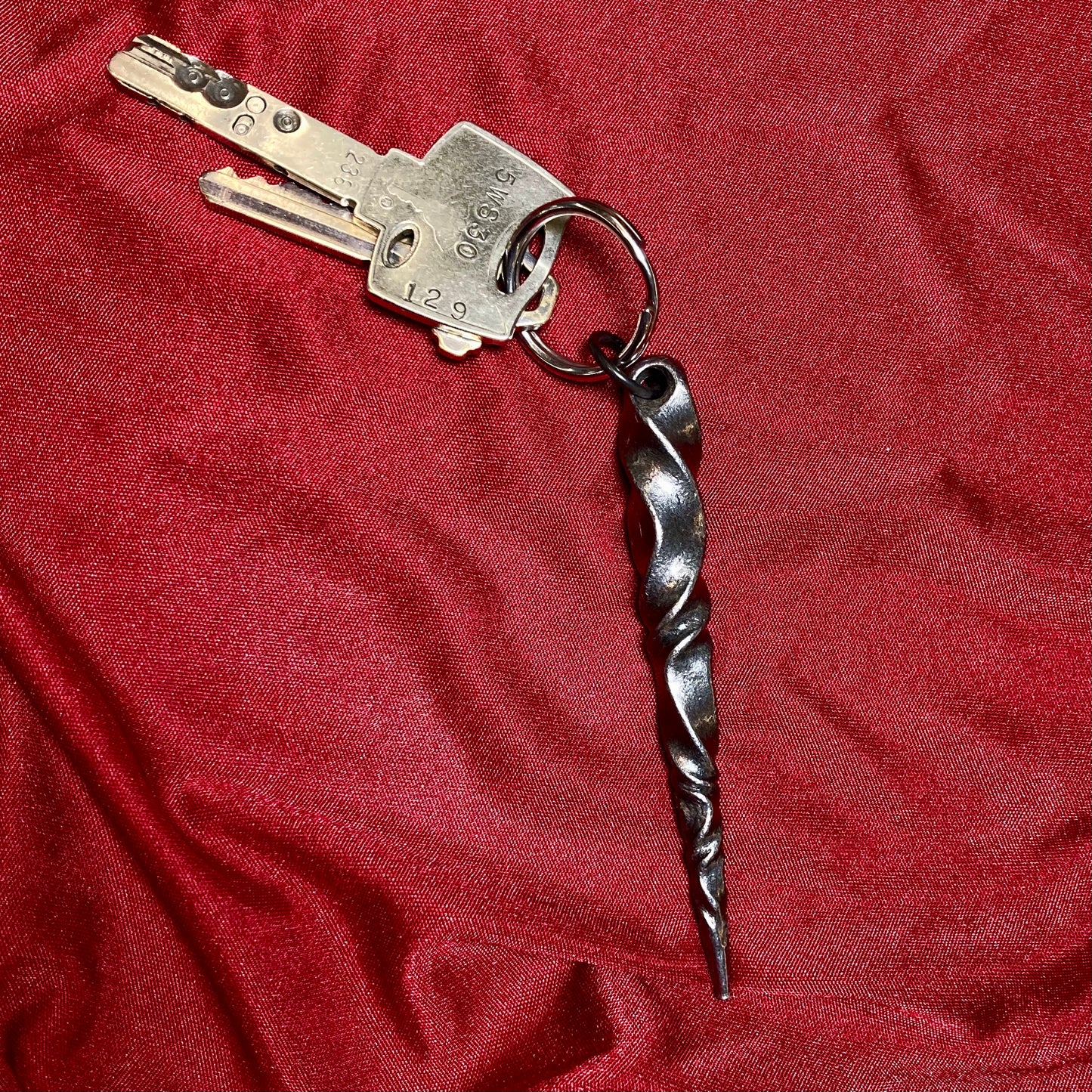 Twisted metal spike key ring fob